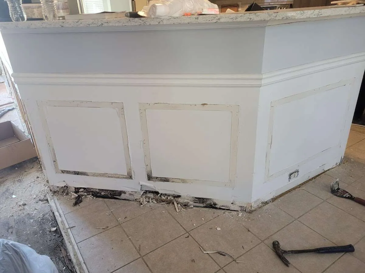 Water damage and mold on kitchen during Storm Damage Restoration in Cottage Lake